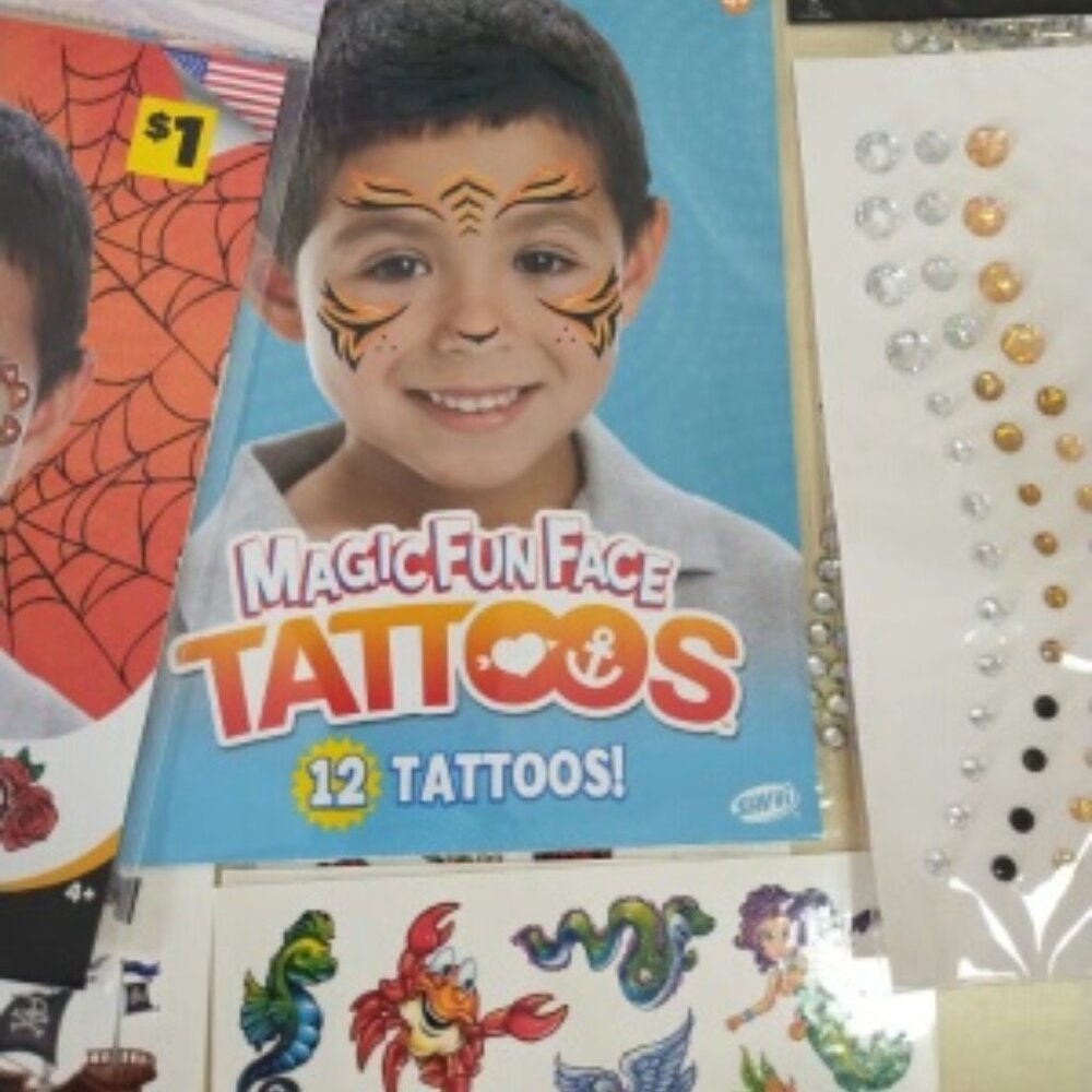 Assorted lot of new fun temporary tattoos and face gems - still in pack